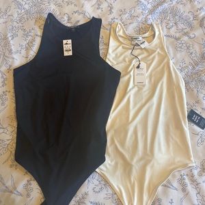Express. Two body contour bodysuits.